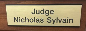 Nameplate sign for Judge Nicholas Sylvain
